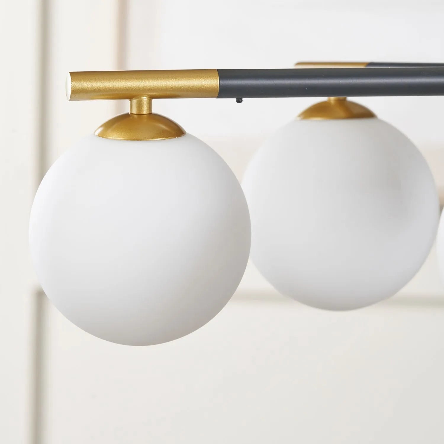White Glass Orb 5 Light Pendant Ceiling Light with Black & Gold Metal Frame – Modern Pendant for Contemporary Interiors 120x55x55cm | Click Style