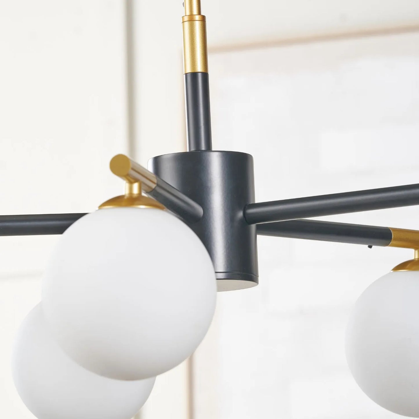 White Glass Orb 5 Light Pendant Ceiling Light with Black & Gold Metal Frame – Modern Pendant for Contemporary Interiors 120x55x55cm | Click Style