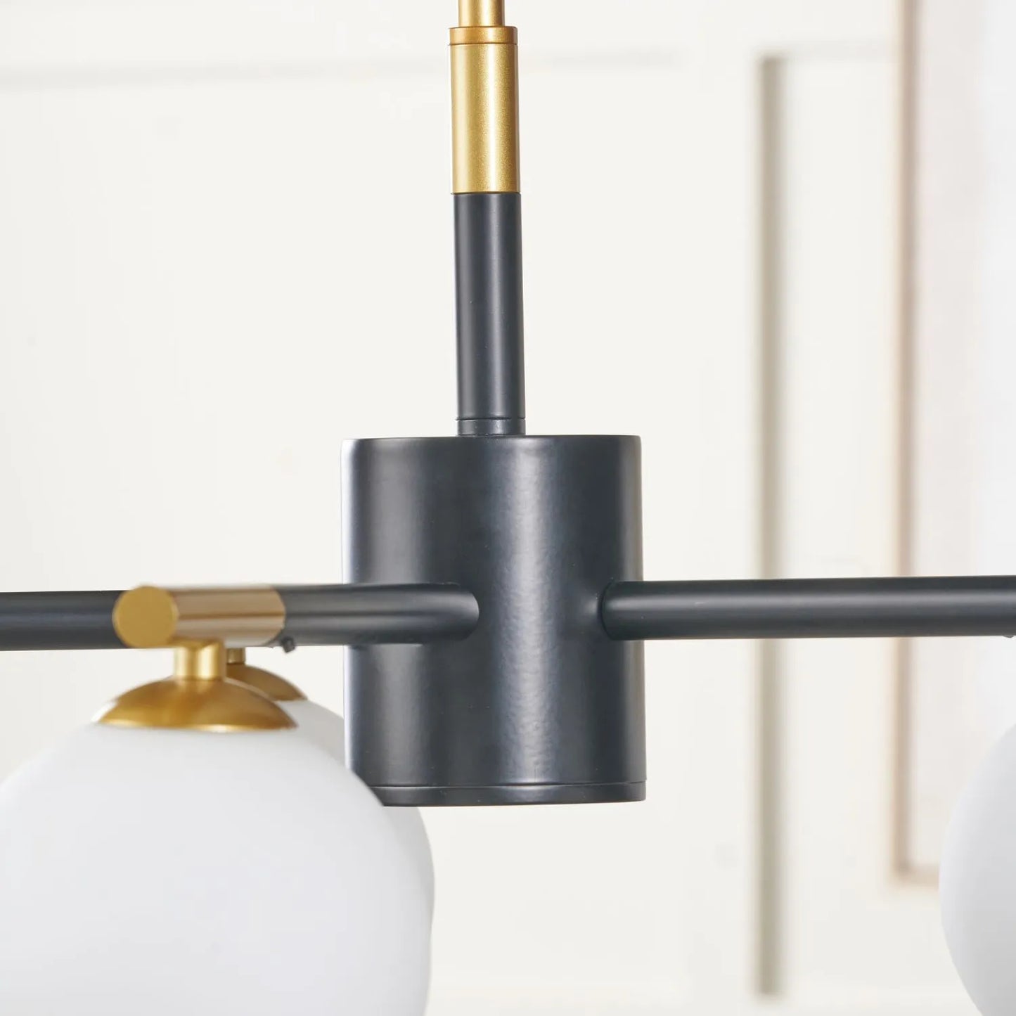 White Glass Orb 5 Light Pendant Ceiling Light with Black & Gold Metal Frame – Modern Pendant for Contemporary Interiors 120x55x55cm | Click Style