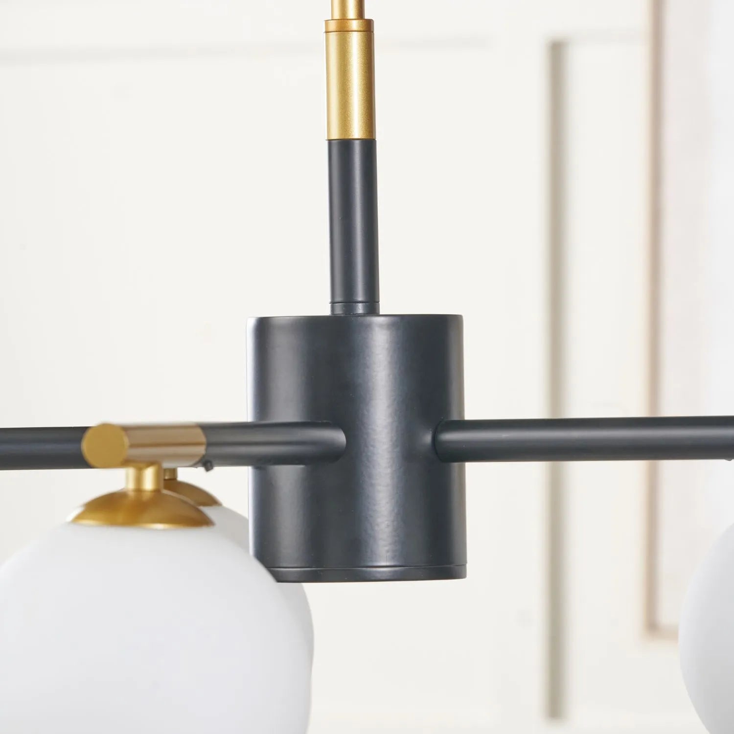 White Glass Orb 5 Light Pendant Ceiling Light with Black & Gold Metal Frame – Modern Pendant for Contemporary Interiors 120x55x55cm | Click Style
