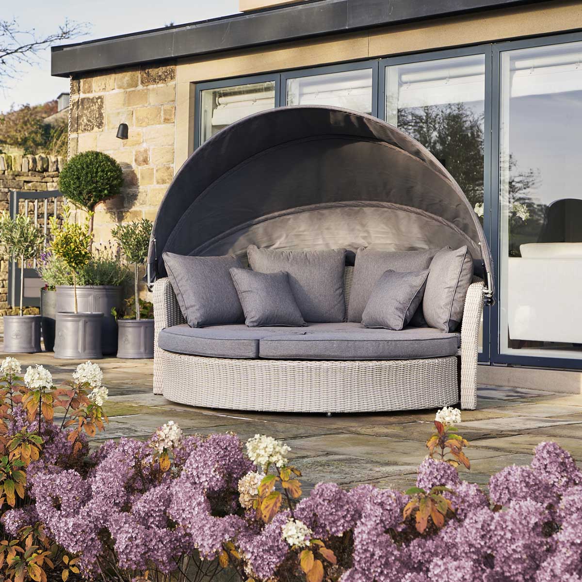 Avalonia Stone Grey Rattan Effect Round Garden Daybed with Canopy – Click Style