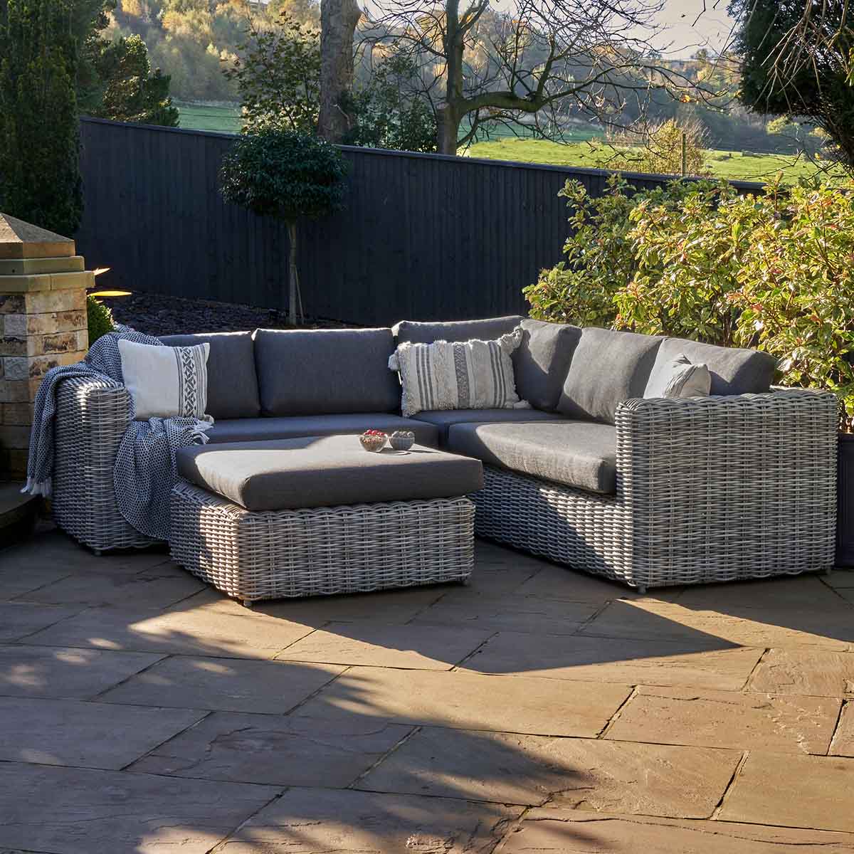 Celebes Grey Rattan Effect Garden Corner Sofa Set & Footstool – Click Style