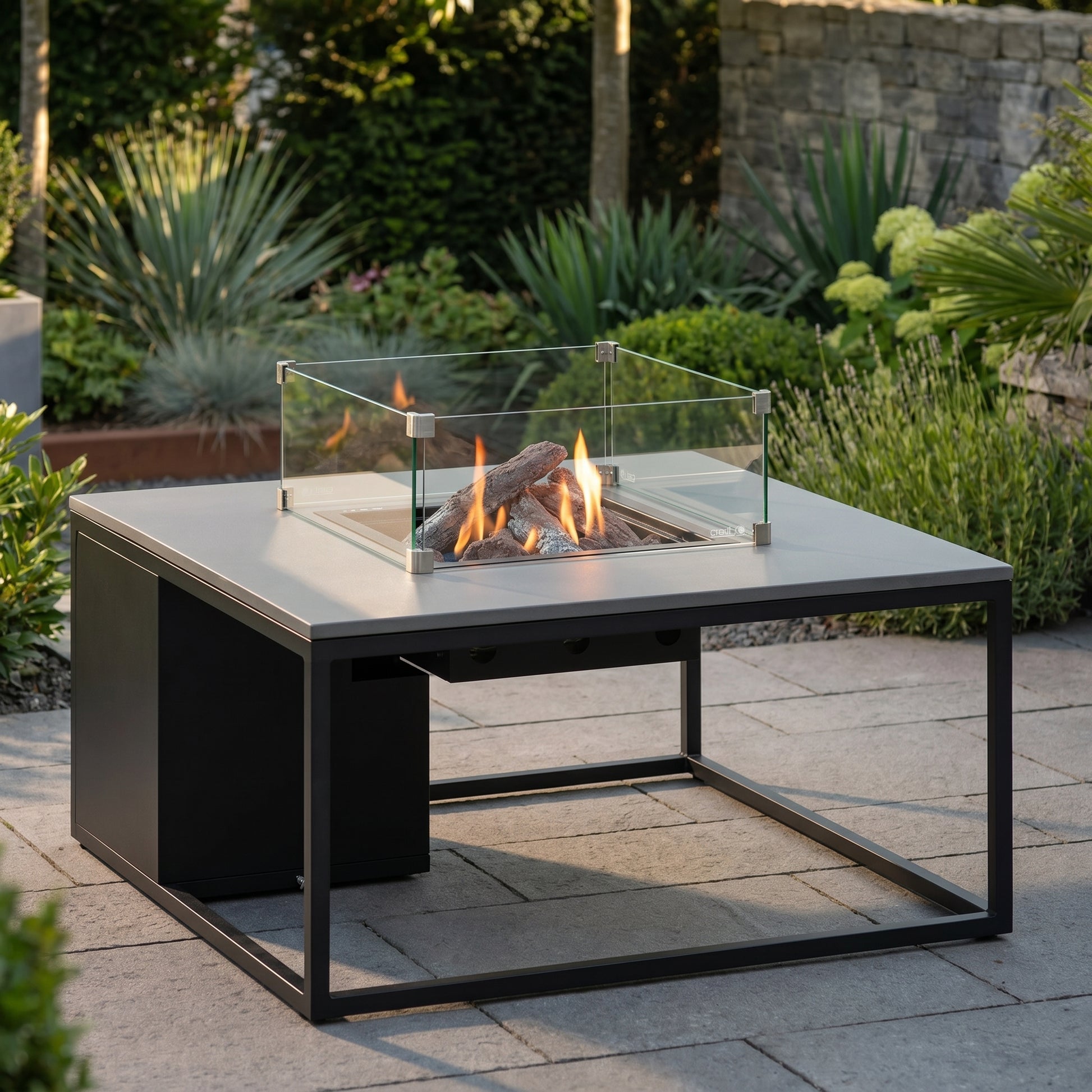 Cosiloft 100 Square Outdoor Gas Fire Pit Table with Black Metal Base & Grey Aluminium Top – Freestanding Garden Coffee Table Firepit 50x100x100cm – propane gas outdoor fire pit table with 9kW heat output, integrated gas burner with ceramic logs and lava stones, hidden 5kg gas bottle storage, weather-resistant aluminium frame, modern patio heater coffee table for garden, patio, decking and outdoor seating areas | Click Style