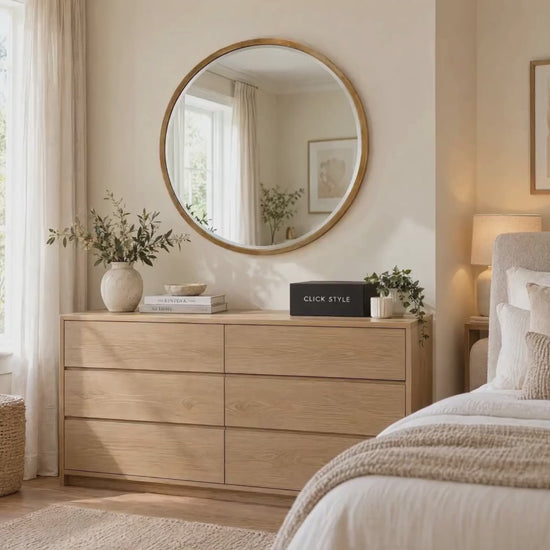 Large Round Antique Gold Wall Mirror with Slim Metal Frame & Bevelled Glass – Decorative Circular Mirror 80x2cm displayed above a natural oak chest of drawers in a beautifully styled neutral bedroom with soft natural daylight and CLICK STYLE branding | Click Style
