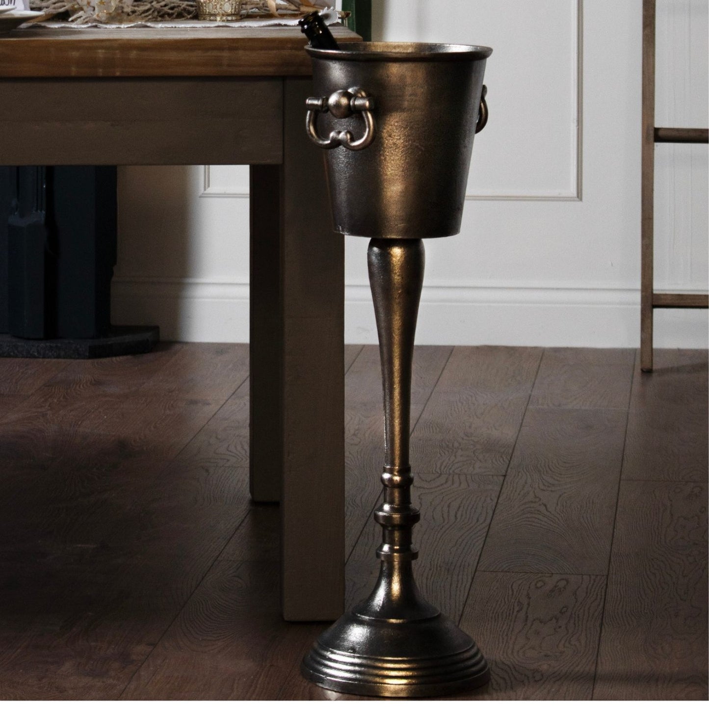 Tall silver champagne cooler and bucket