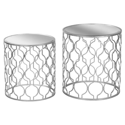 Pair of silver side tables with an ornate frame