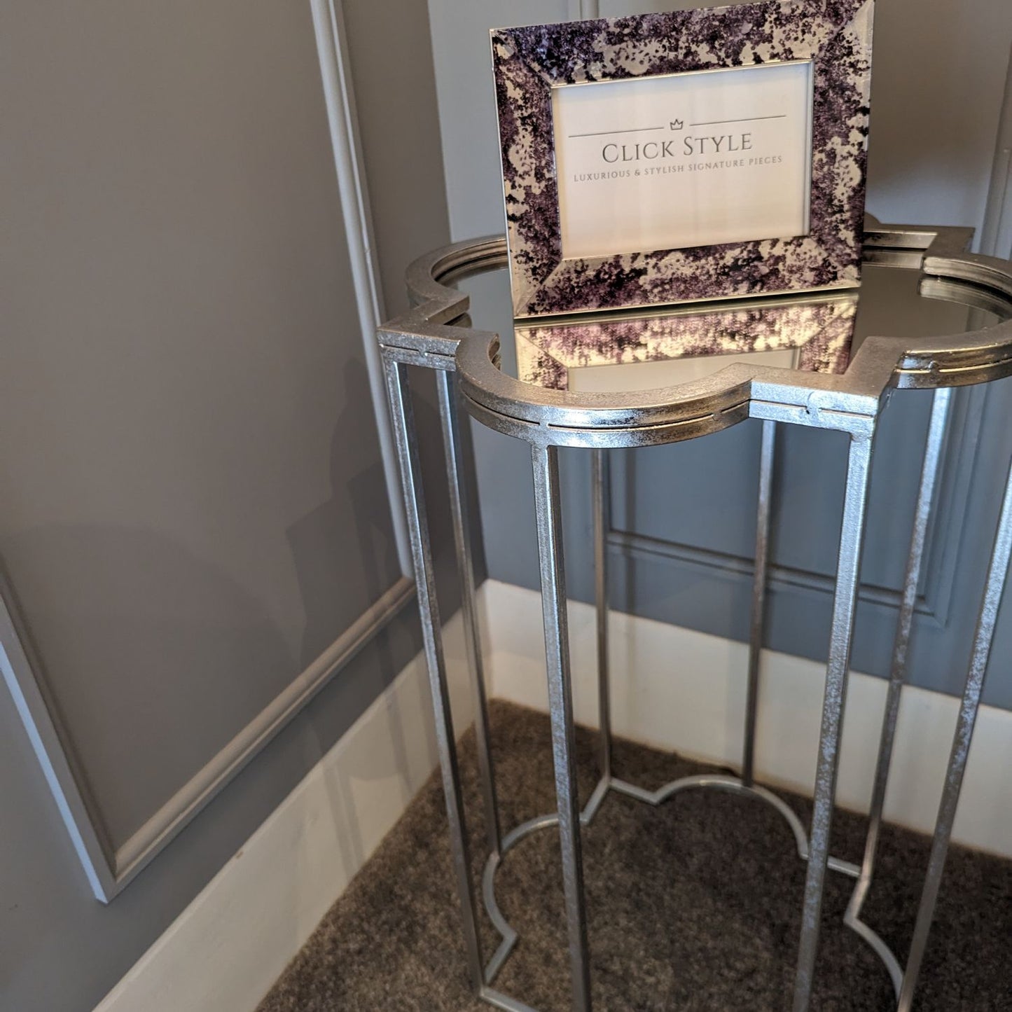 Two foil silver mirrored side tables