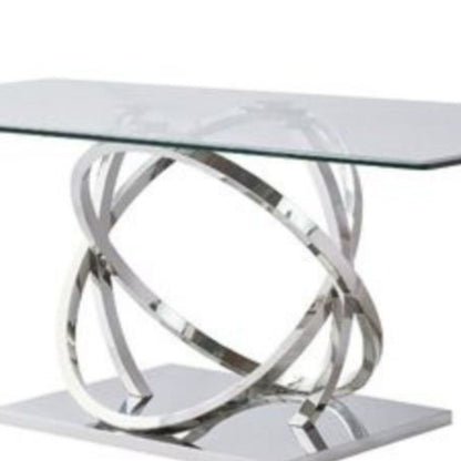 Silver and glass dining table with ring design